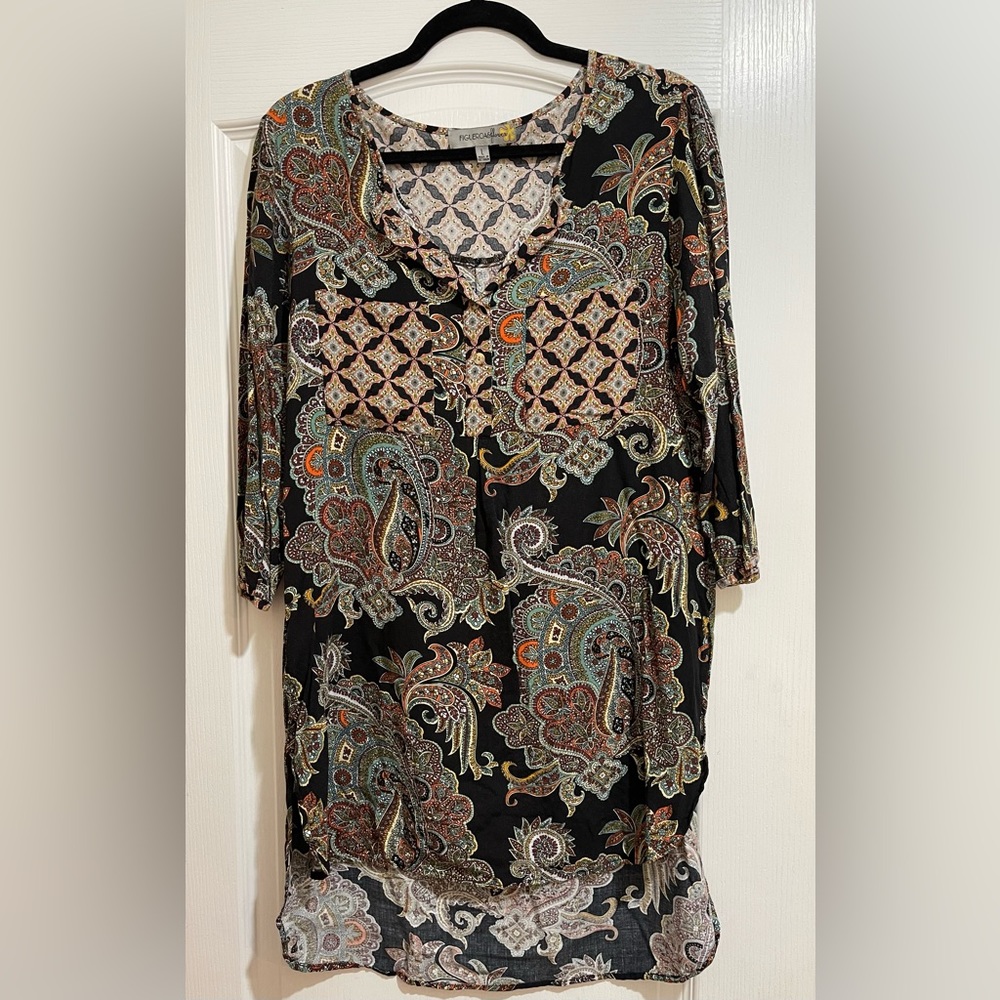 Women’s black blouse with designs throughout
